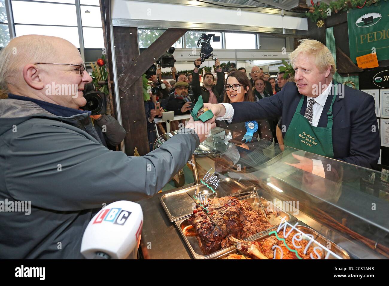 Prime Minister Boris Johnson at the Royal Welsh Winter Fair on the 25th of November 2019. Boris Johnson takes a walkabout with Brecon and Radnor Conse Stock Photo