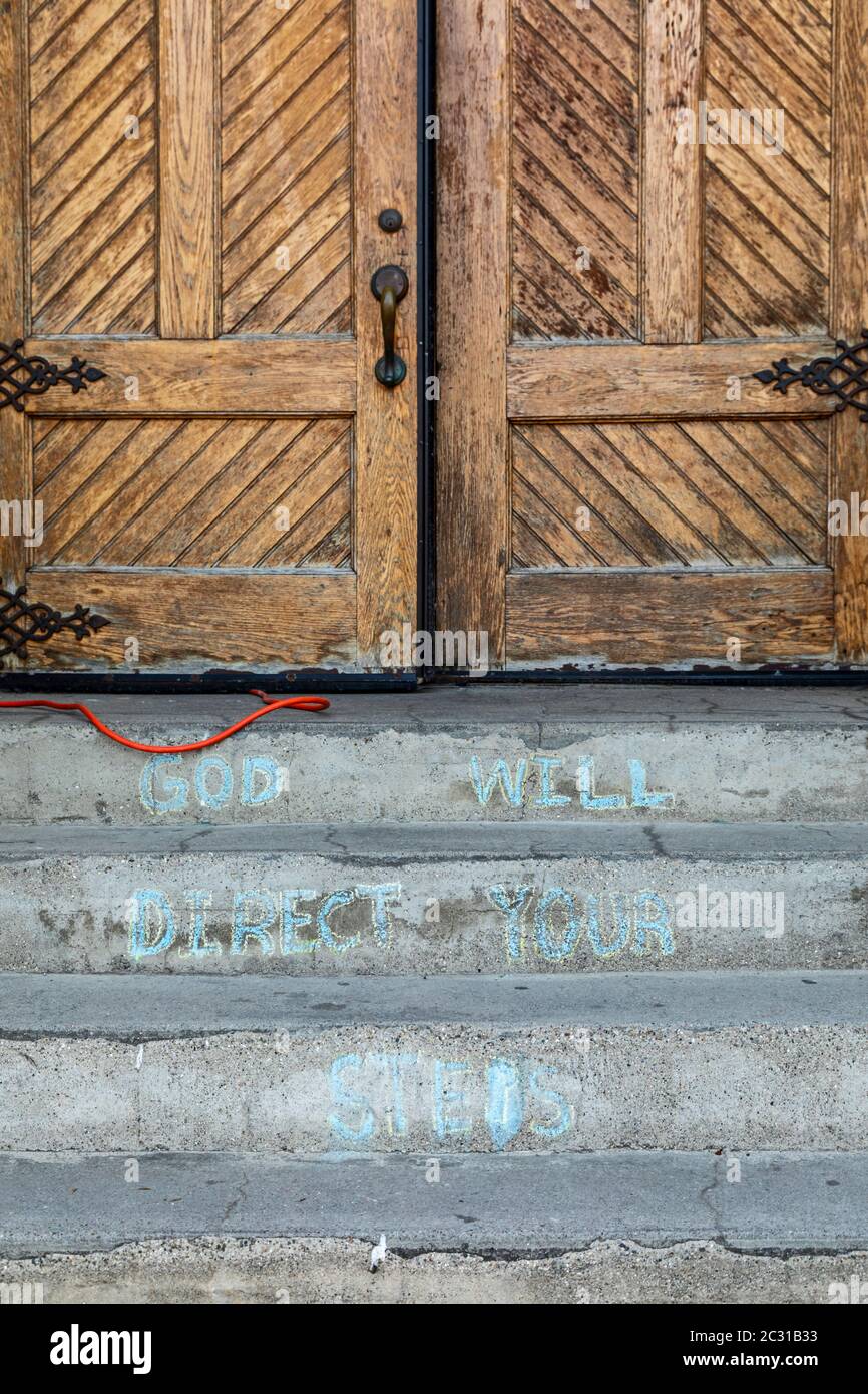 Detroit, Michigan - A message chalked on the steps of Ste. Anne de Detroit Catholic Church. Founded in 1701 by French colonists, the parish is now mos Stock Photo