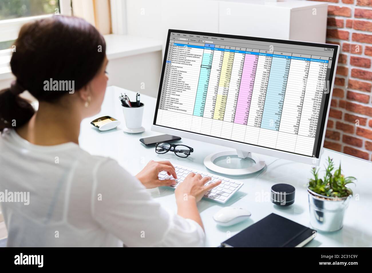 Working With Spreadsheet. Analyzing Data On Laptop Screen Stock Photo