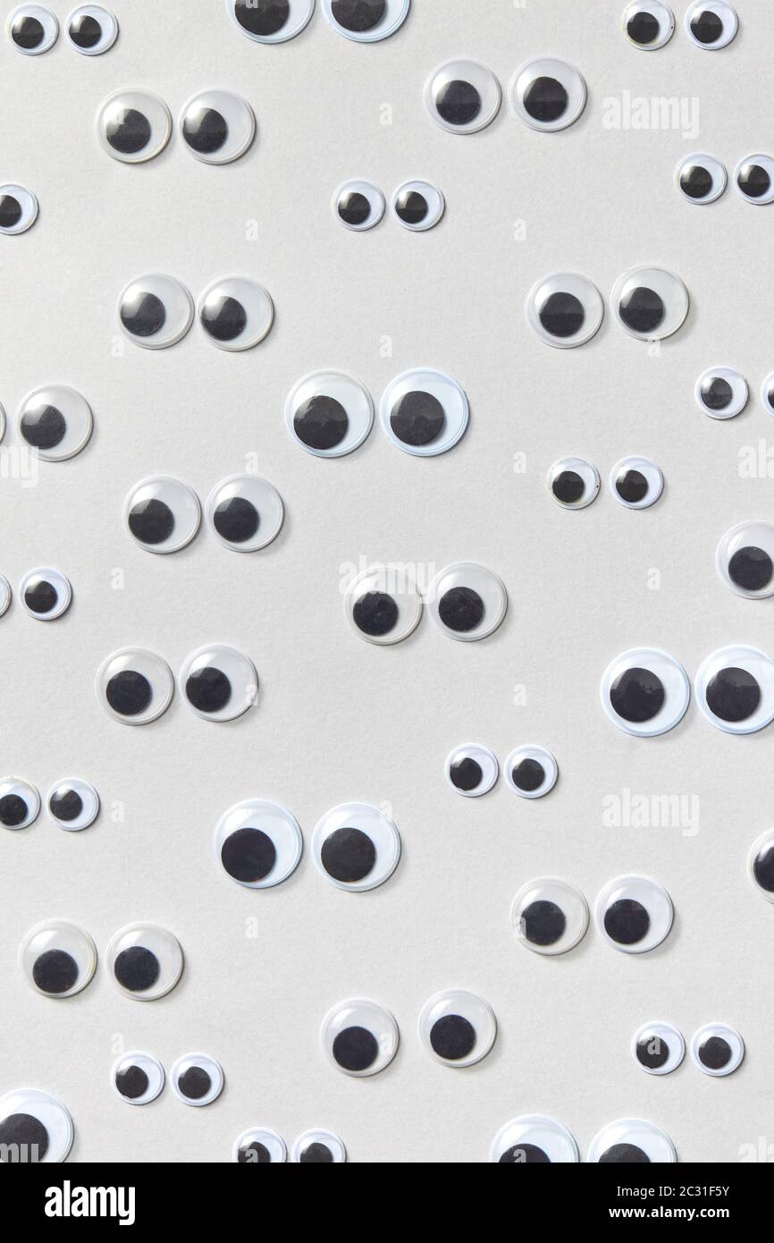 Creative pattern from plastic googly eyes Stock Photo Alamy
