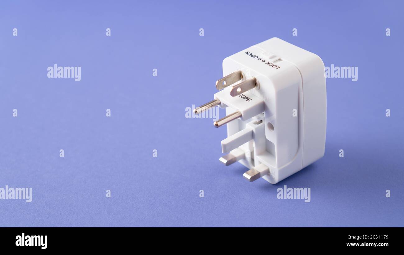 Universal international worldwide travel AC power plug adapter AU UK US EU. Universal multi socket. Double USB Port. Stock Photo