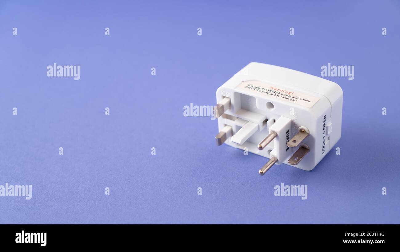 Universal international worldwide travel AC power plug adapter AU UK US EU. Universal multi socket. Double USB Port. Stock Photo
