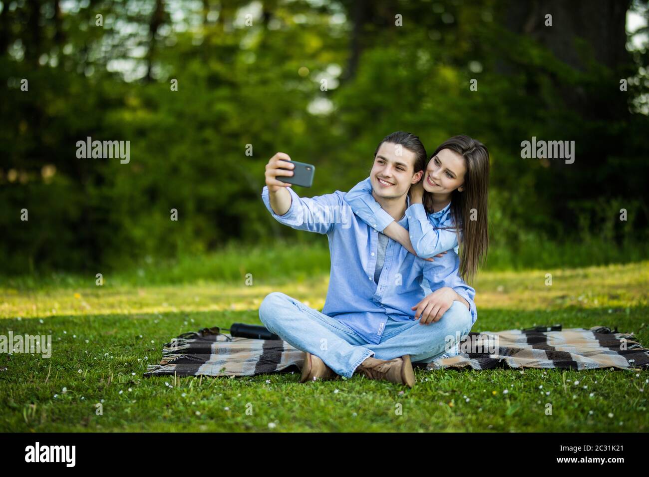 Premium AI Image | Shot of a young couple taking selfies in the city