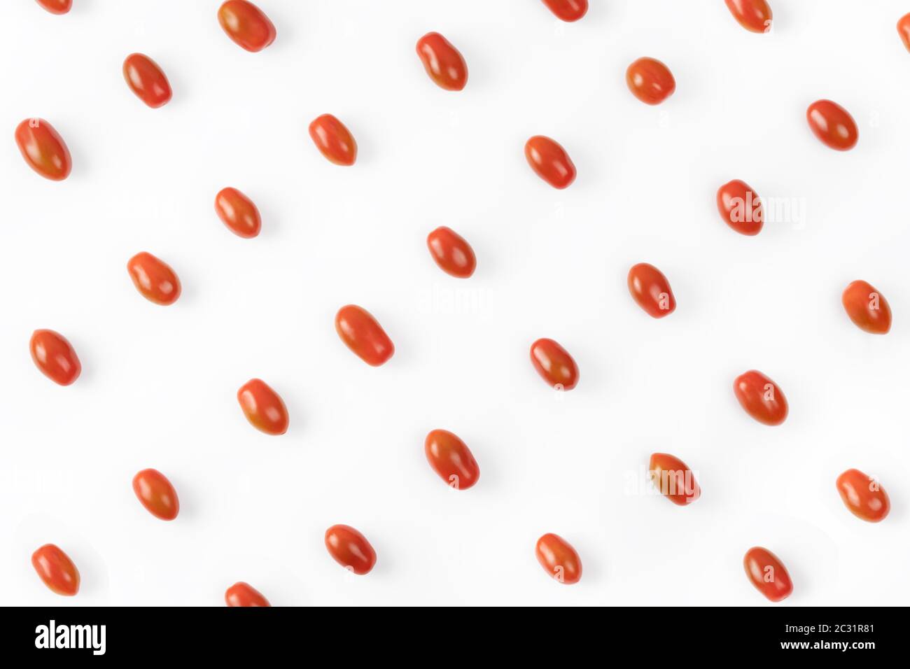 Grape tomato pattern on white background. Small tomatoes cherry top view. Stock Photo
