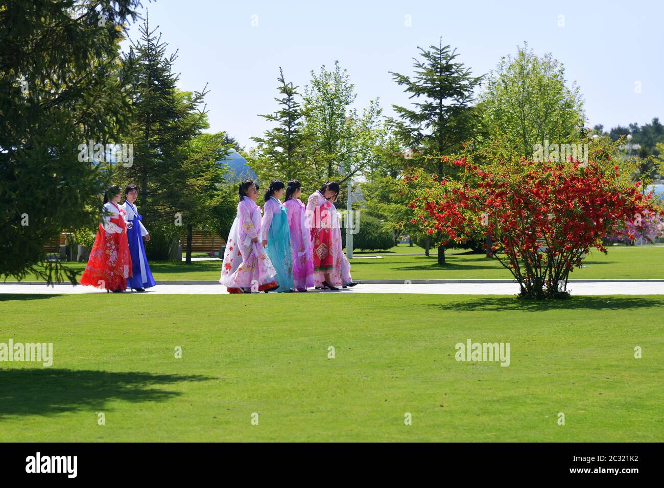 Pyongyang, North Korea - May 2, 2019: Women in traditional Hanbok dresses on the territory Kumsusan Memorial Palace of the Sun. Mausoleum of Kim Il Su Stock Photo