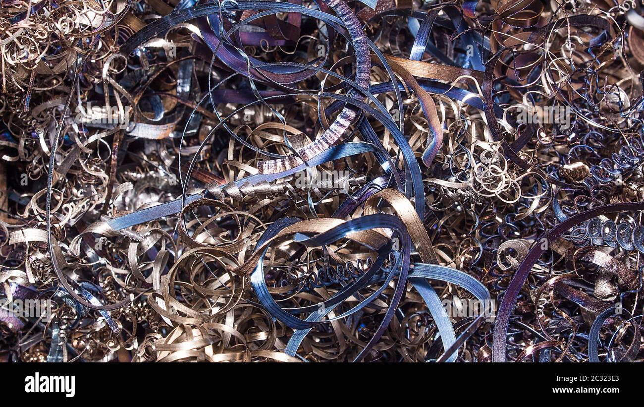 Abstract color background of metal shavings. Processing of ferrous and ...