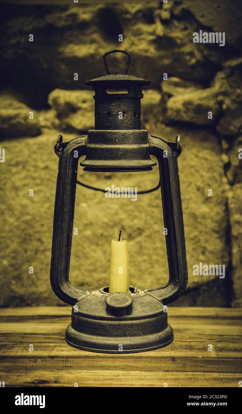Old candle with wax candle, lighting detail Stock Photo Alamy