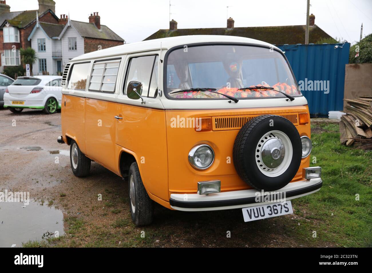 A CLASSIC VOLKSWAGEN CAMPER VAN BUS PARKED IN A CAR PARK Stock Photo ...