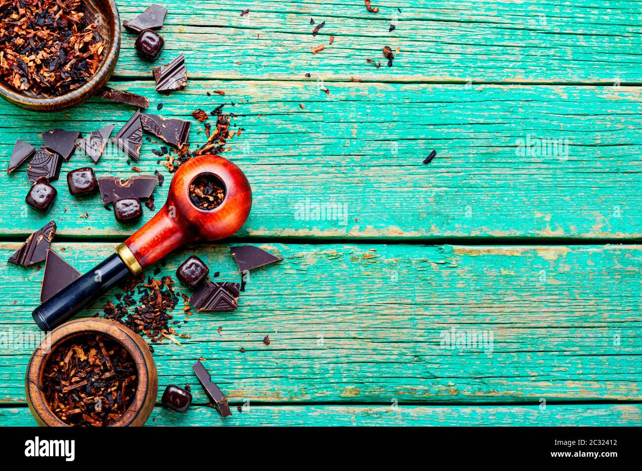 Chocolate flavored tobacco for smoking pipes.Tobacco pipe filled with