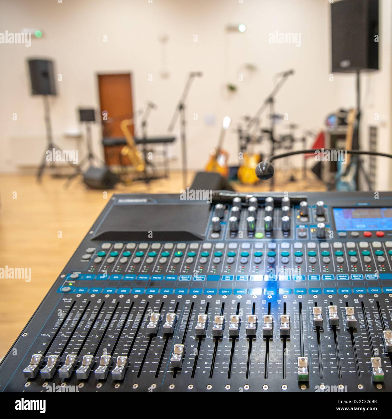 audio mixing console for controlling the sound of a music band at a