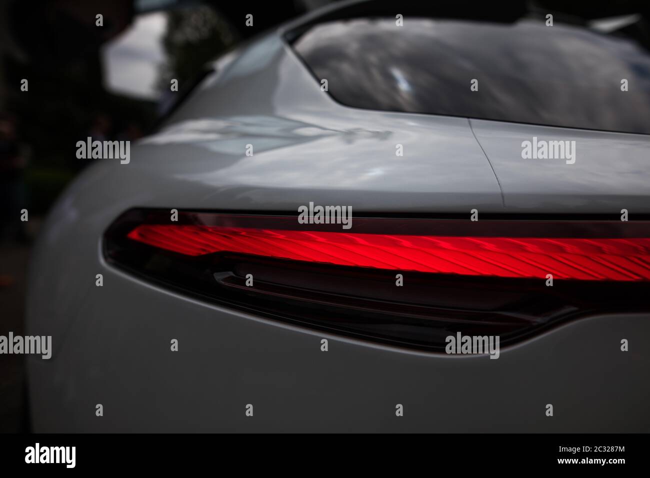 Close up horizontal image of the LED tail lights of a new sport super