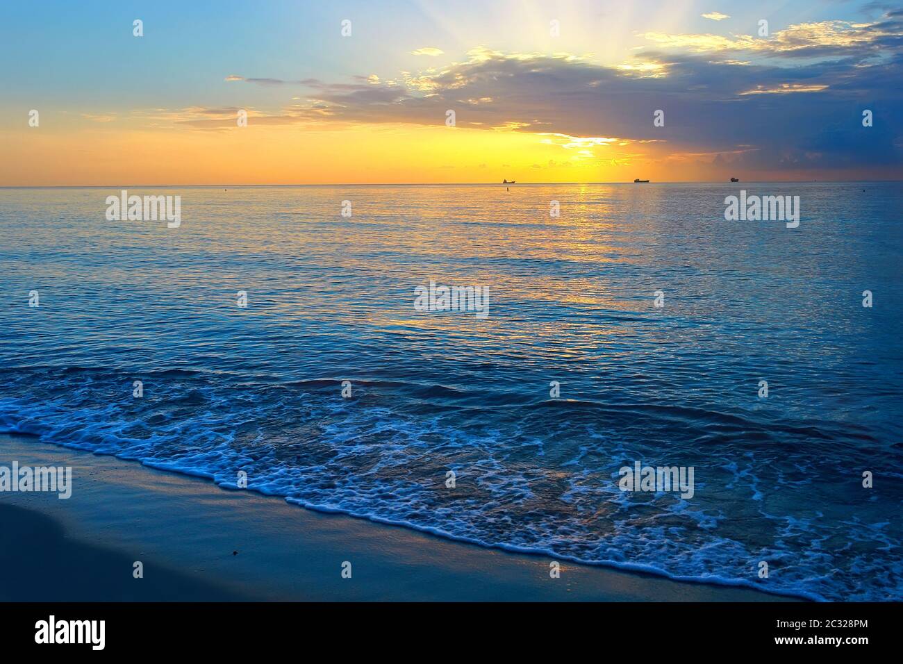 Sunrise over Atlantic ocean Stock Photo - Alamy