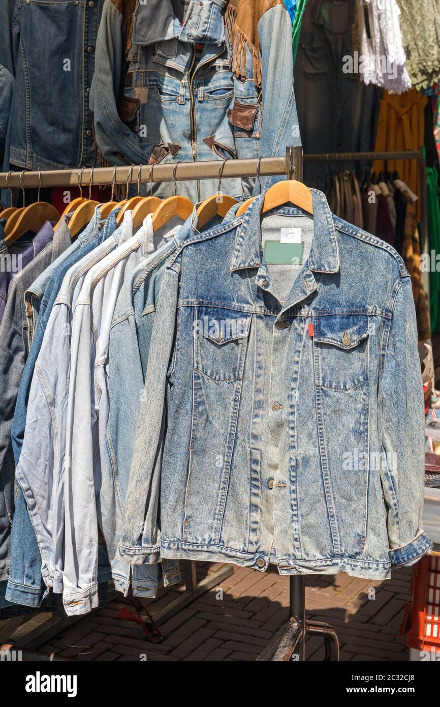 Second Hand Jeans Jackets at Flea Market Stock Photo - Alamy