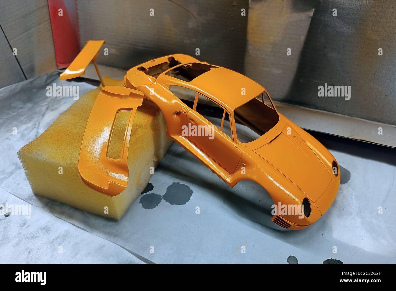 Scale model hobby. Paint the spoiler, trunk lid and toy body in a