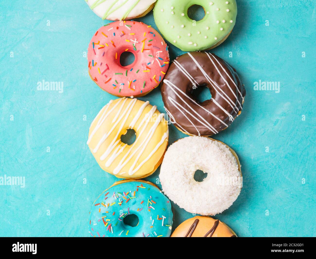 donuts on blue background, top view Stock Photo