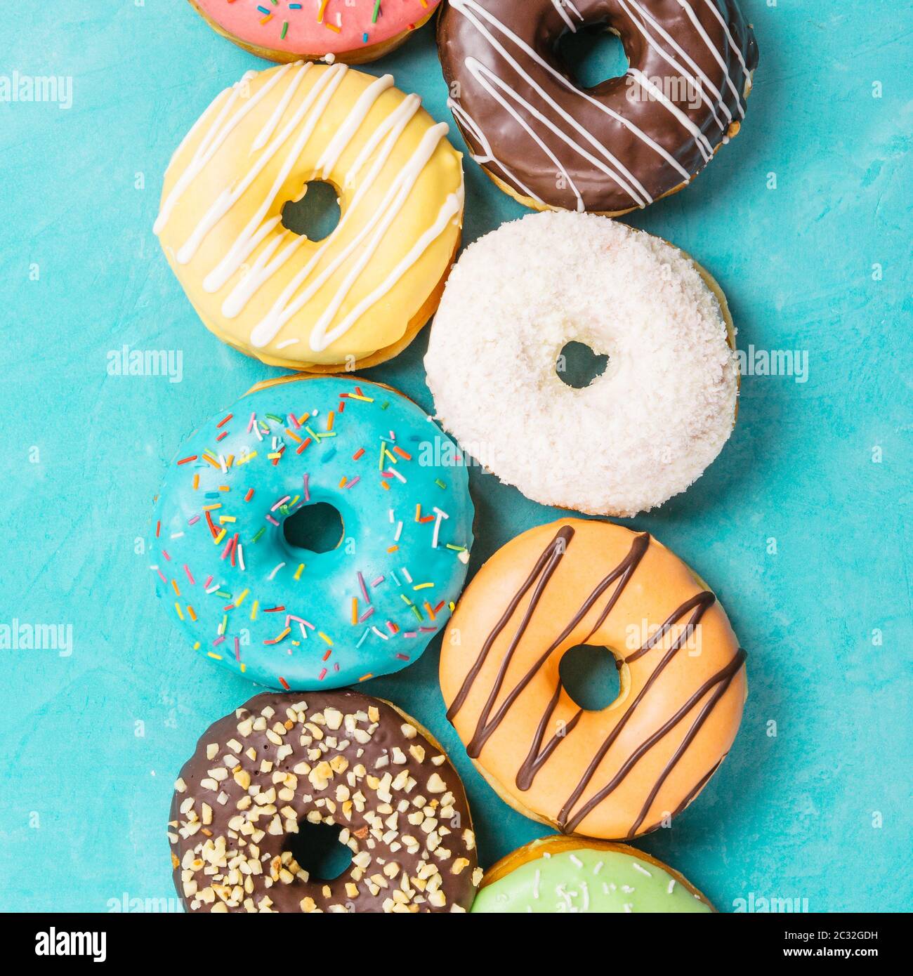 donuts on blue background, top view Stock Photo
