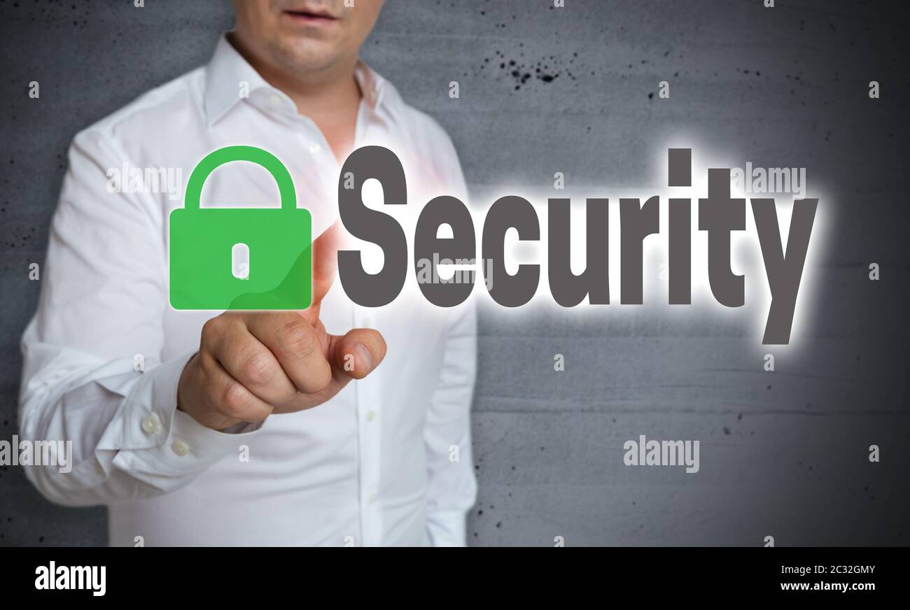 Security touchscreen is operated by man. Stock Photo