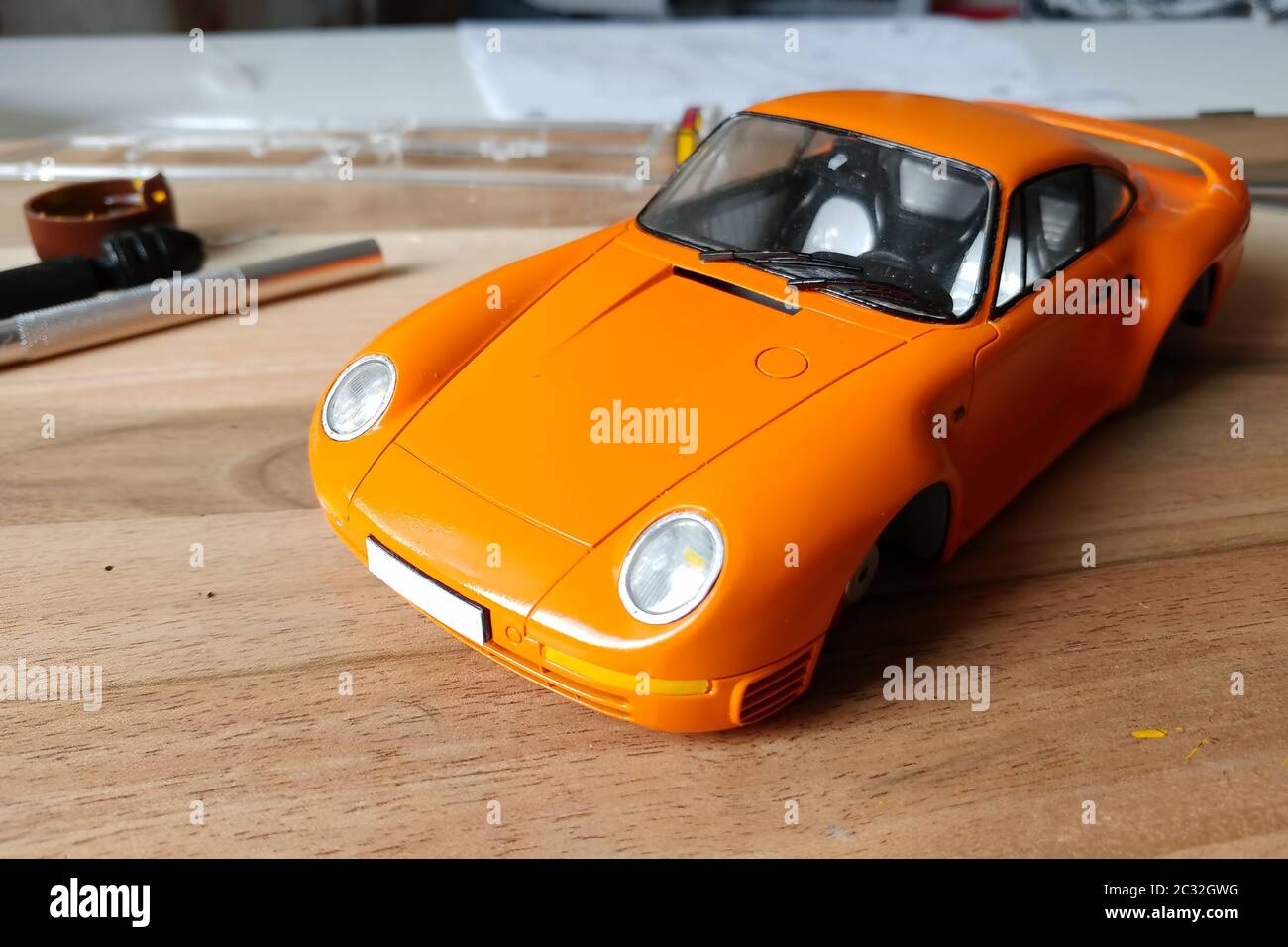 The process of assembling and painting the scale model of the car