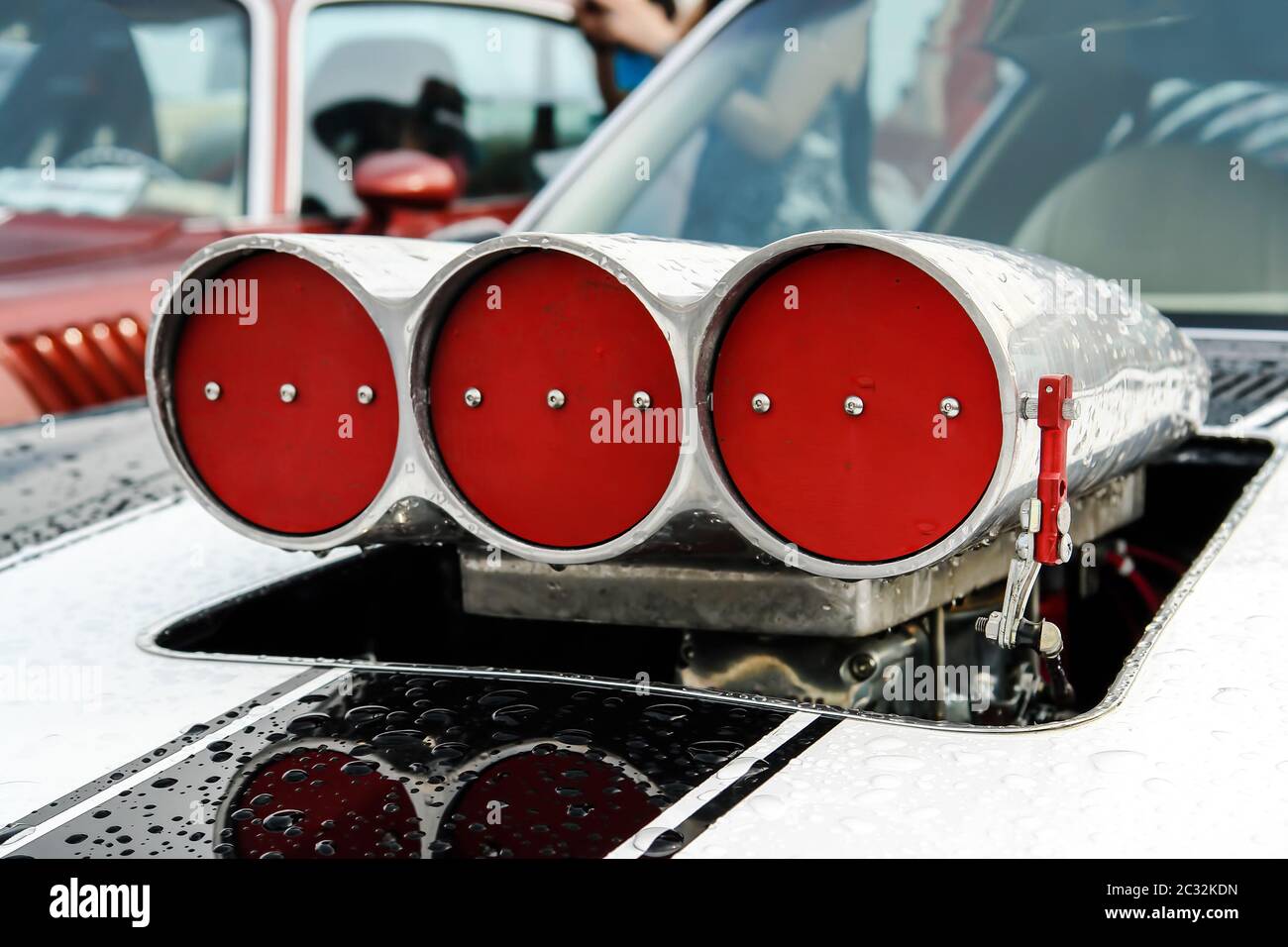 white stripes on the hood and turbo supercharger with red drosels on