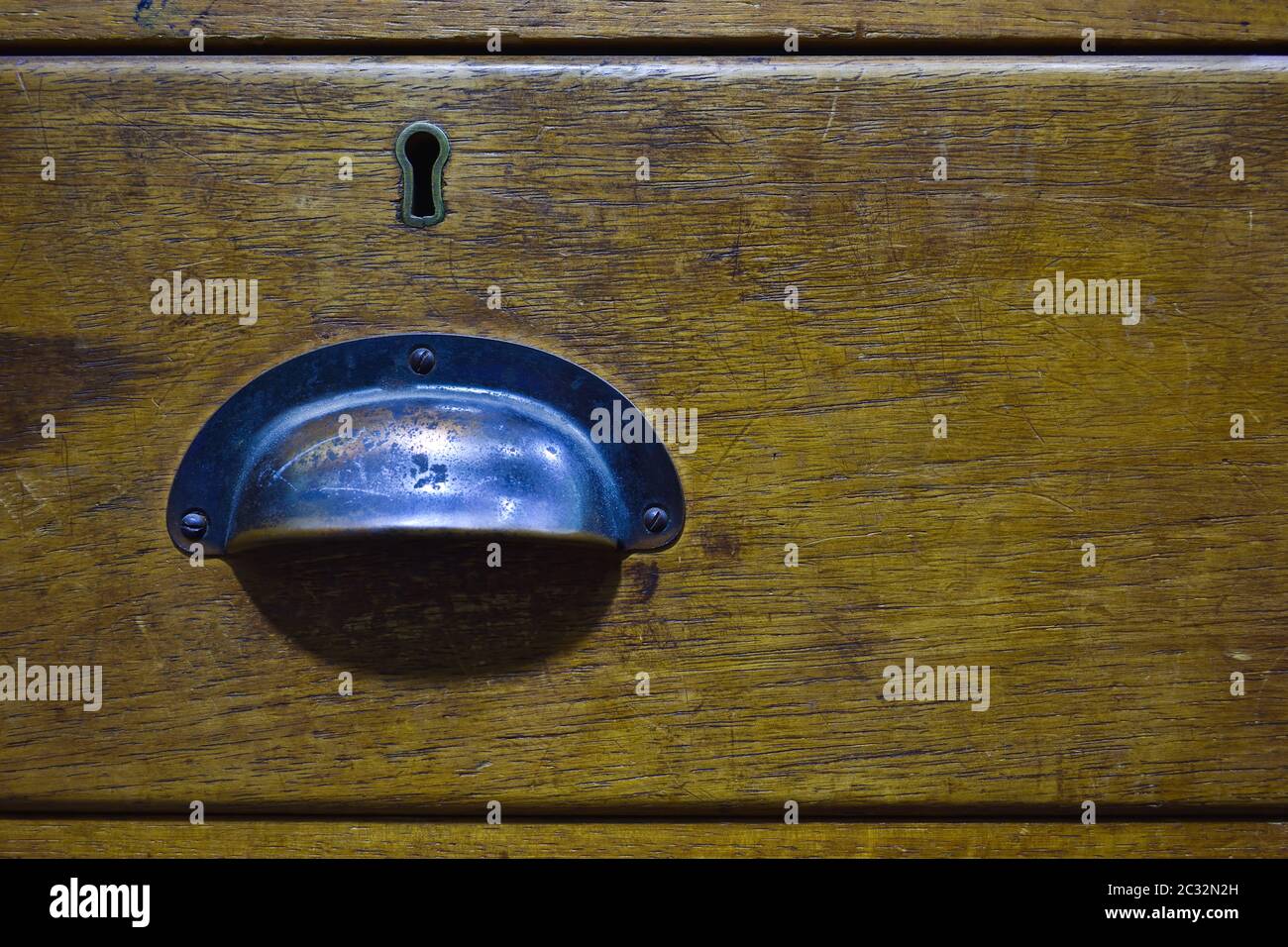 Closed Antique Wooden Desk Drawer Face Stock Photo