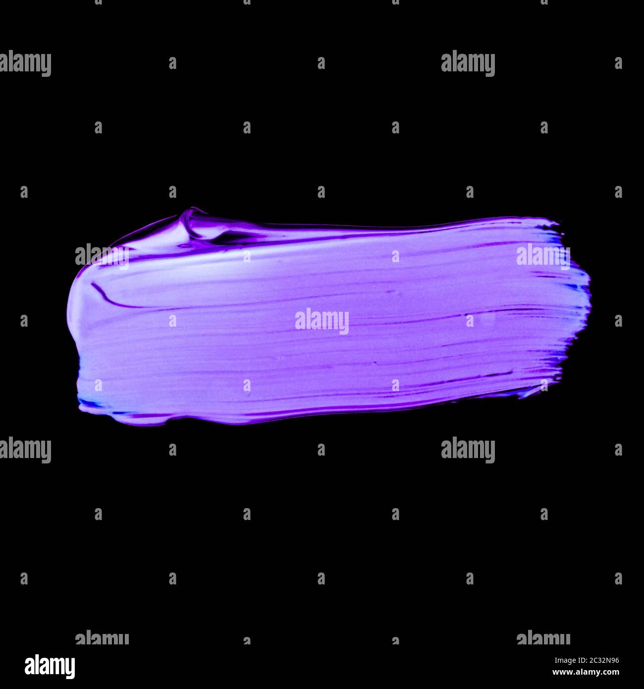 Purple neon paint brush stroke texture isolated on black background