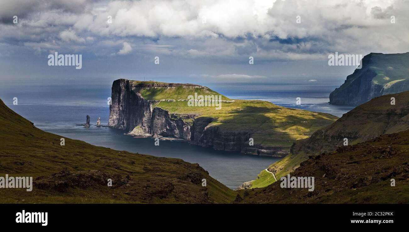 Landscape with view of the coast of Eysturoy in the north Atlantic from Streymoy, Faeroeer, Denmark Stock Photo