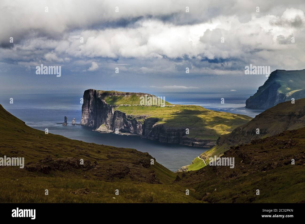 Landscape with view of the coast of Eysturoy in the north Atlantic from Streymoy, Faeroeer, Denmark Stock Photo