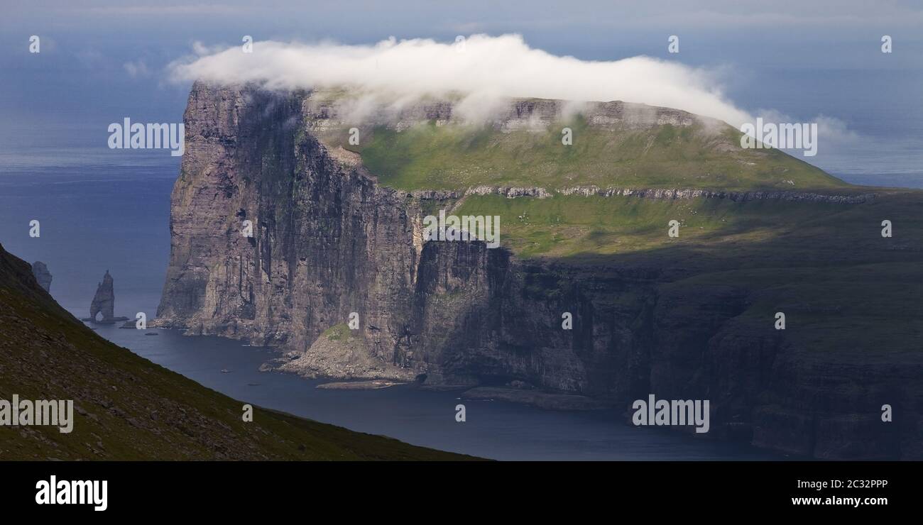 Landscape with view of the coast of Eysturoy in the north Atlantic from Streymoy, Faeroeer, Denmark Stock Photo