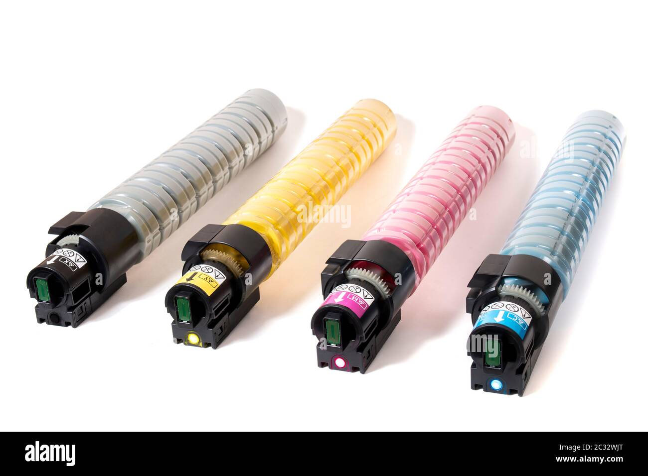 cartridges for laser printers aligned on a white background. Stock Photo