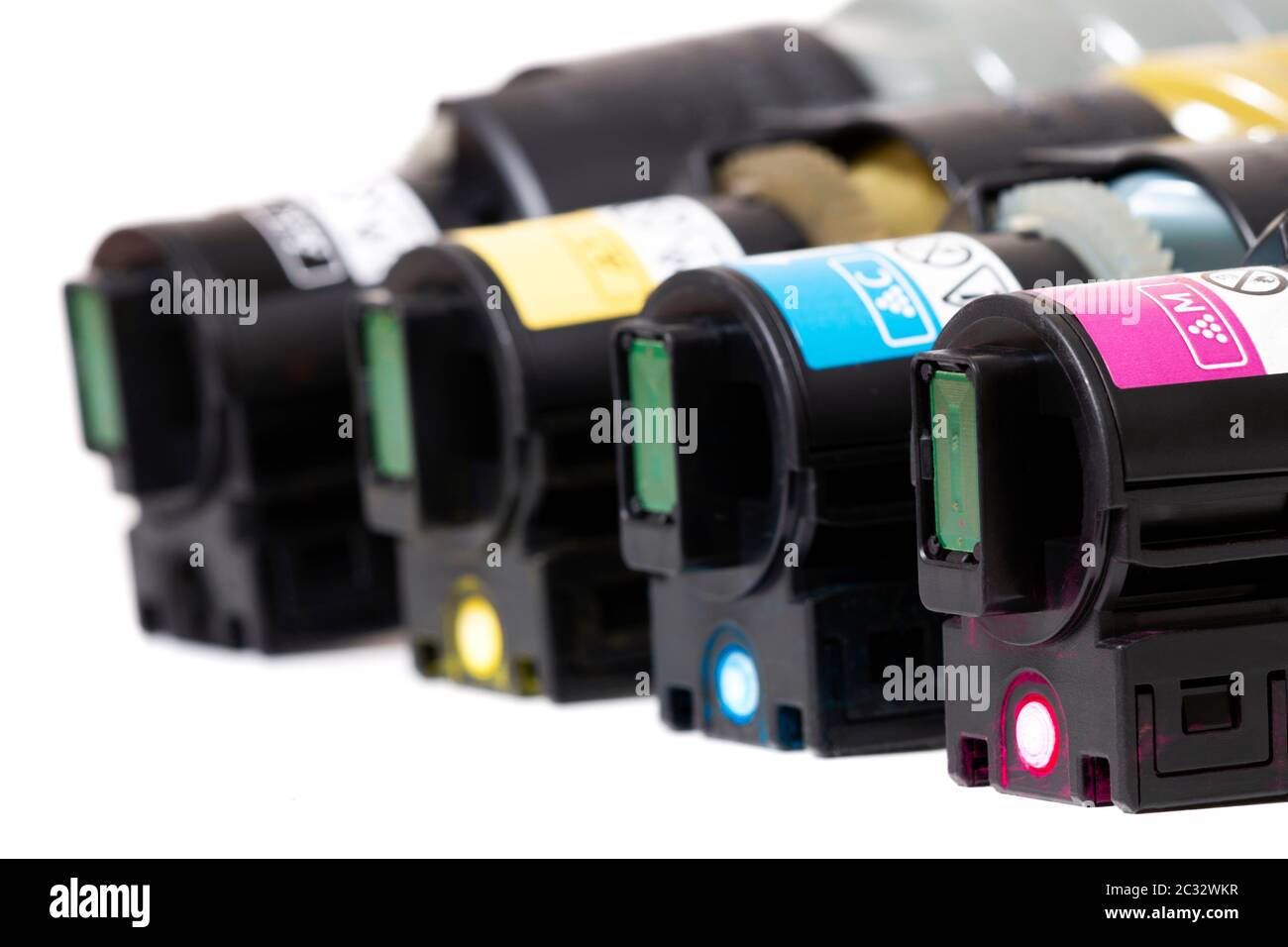 cartridges for laser printers aligned on a white background. Stock Photo