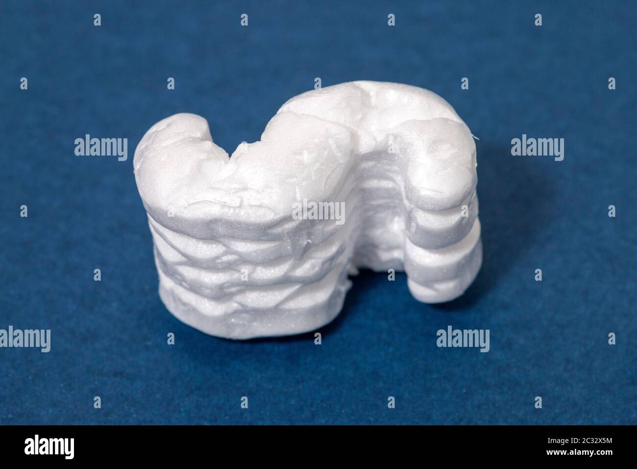 Polystyrene or white styrofoam packing pieces used for minimize bumps ...