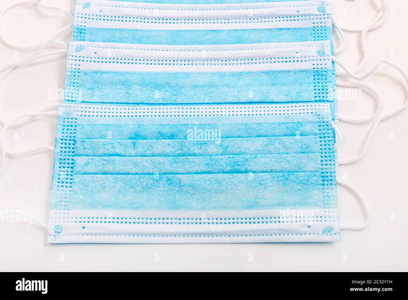 Medical protective masks isolated on a white background Stock Photo - Alamy