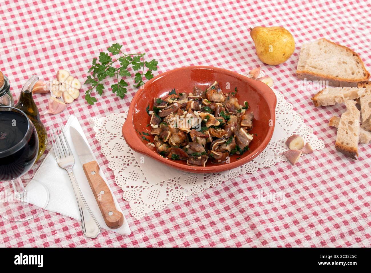 roasted pig ear with garlic and olive oil Stock Photo Alamy