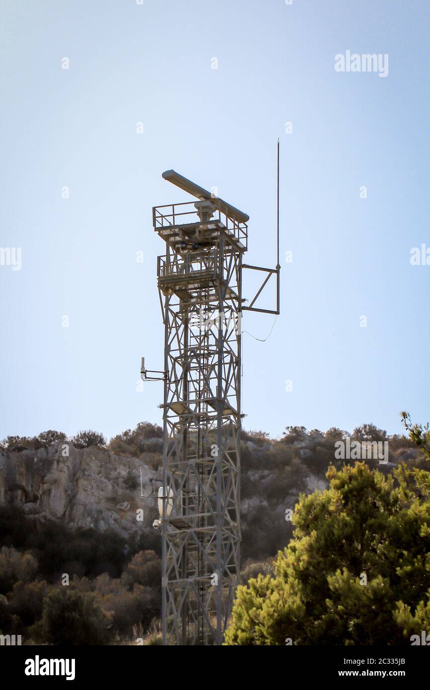 A radar or radio mast for aerial surveillance and data transmission Stock Photo