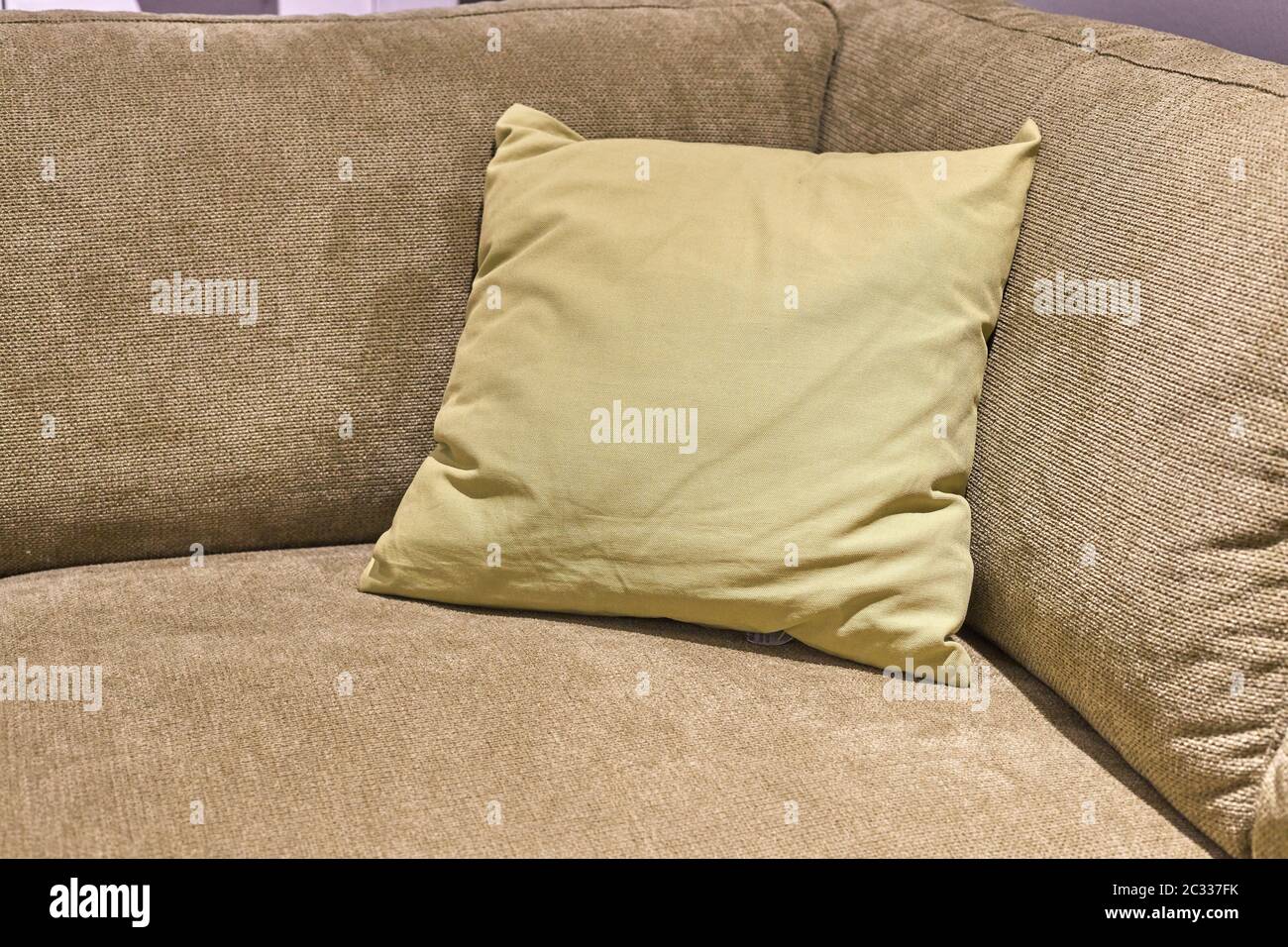 Couch and cushions, simple home interior design Stock Photo - Alamy