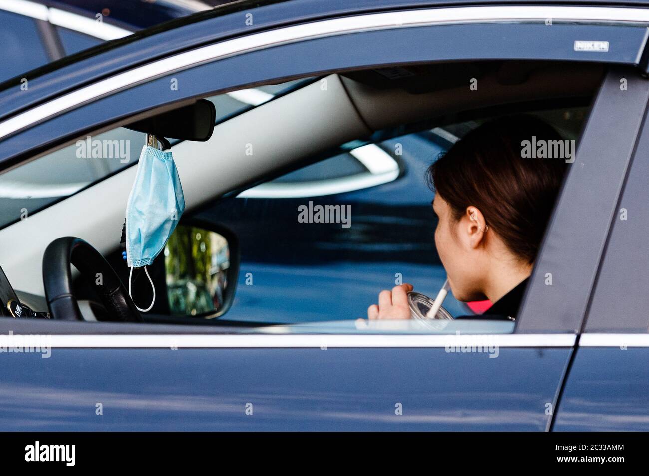 Download Berlin Germany 18th June 2020 Photo Taken On June 18 2020 Shows A Face Mask Hanging On A Rearview Mirror In A Vehicle In Berlin Capital Of Germany German Chancellor Angela Merkel PSD Mockup Templates