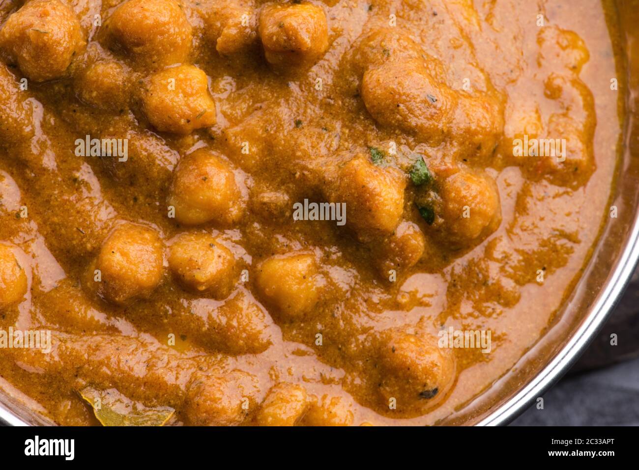 Chana Masala Traditional Indian dish with chickpeas and curry Stock