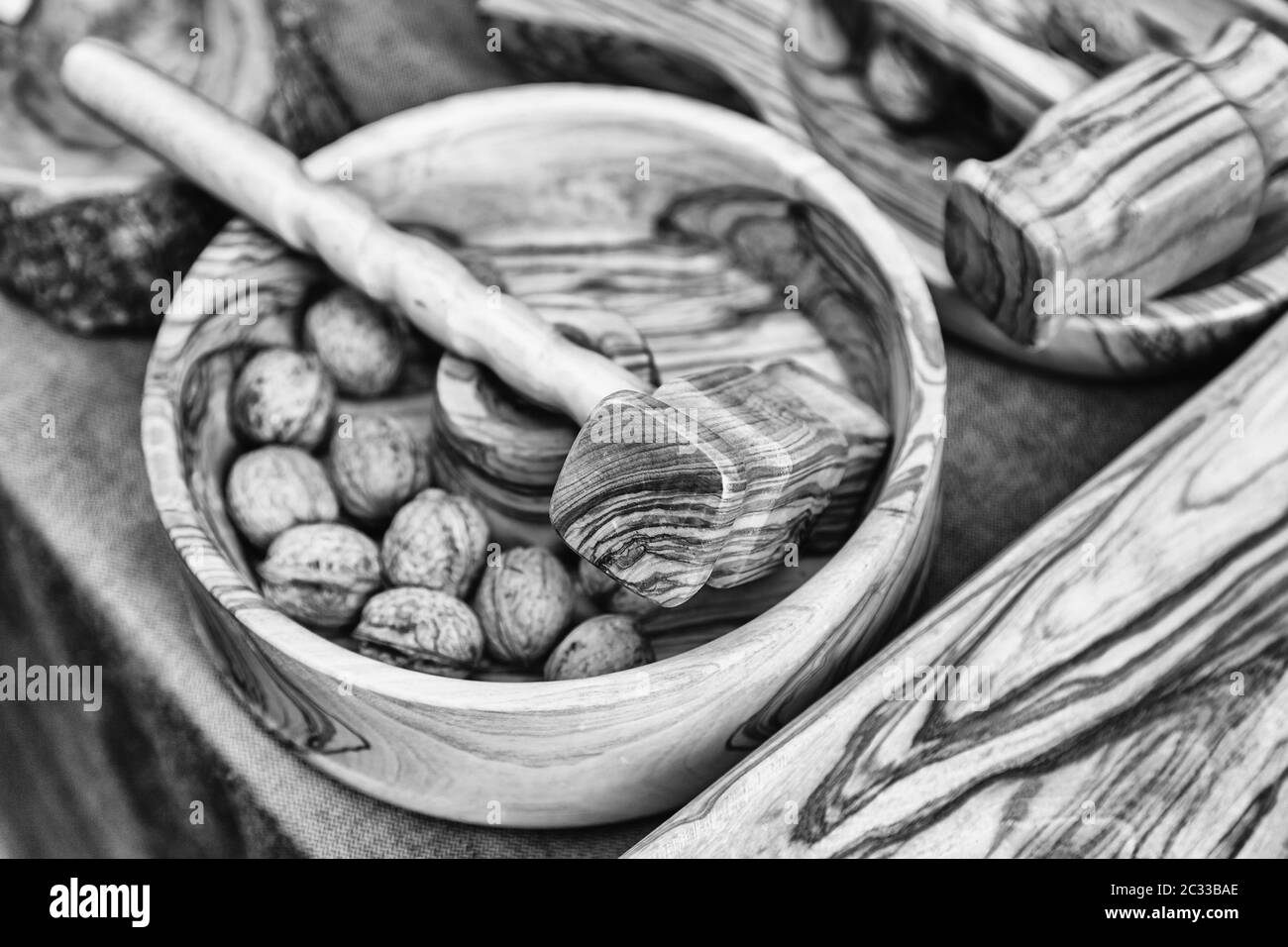 Wooden hammer for cracking nuts, detail of a tool to open nuts Stock