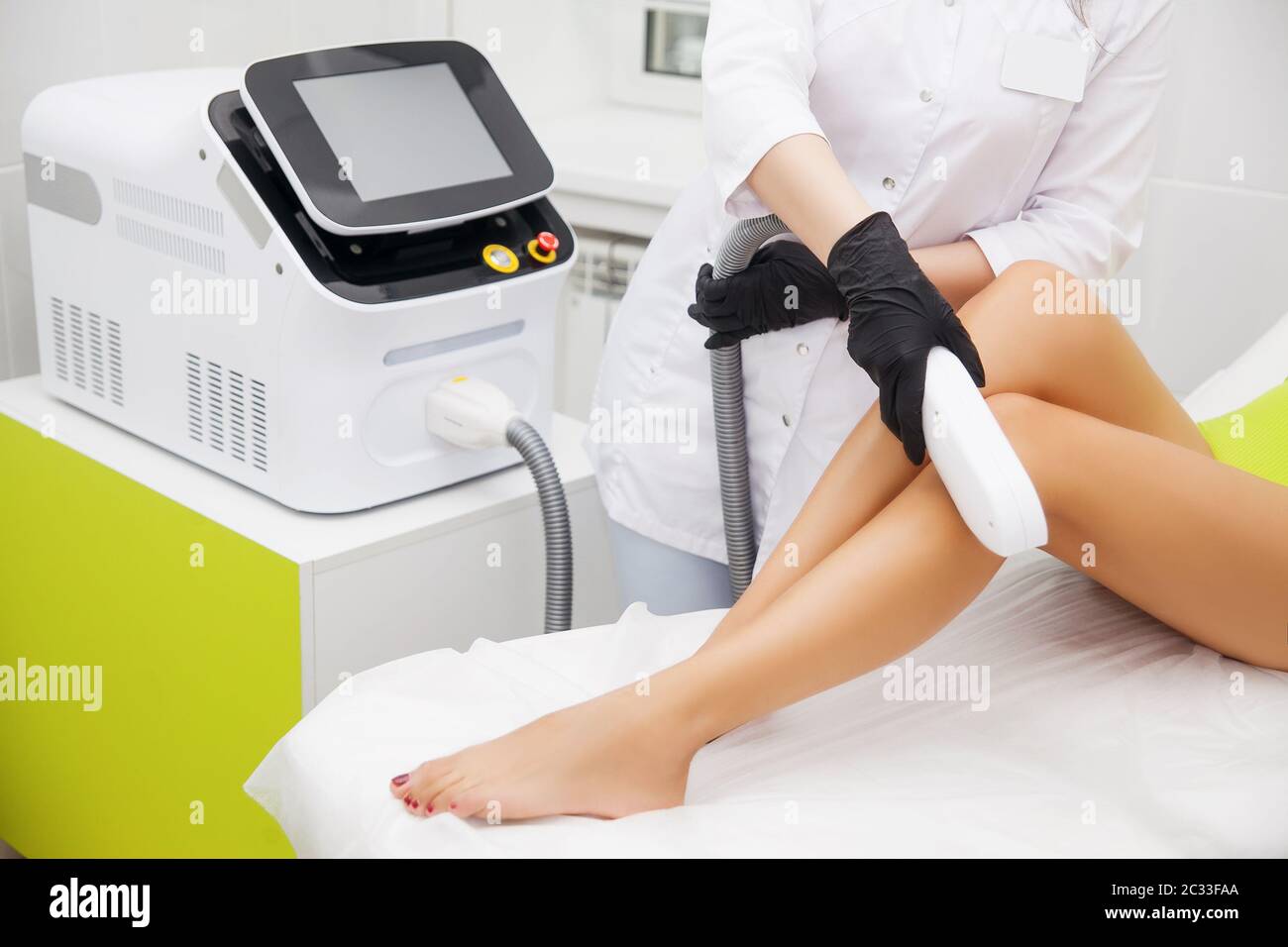 Laser epilation and cosmetology in beauty salon. Hair removal procedure. Laser  epilation, cosmetology, spa, and hair removal concept. Woman getting Stock  Photo - Alamy