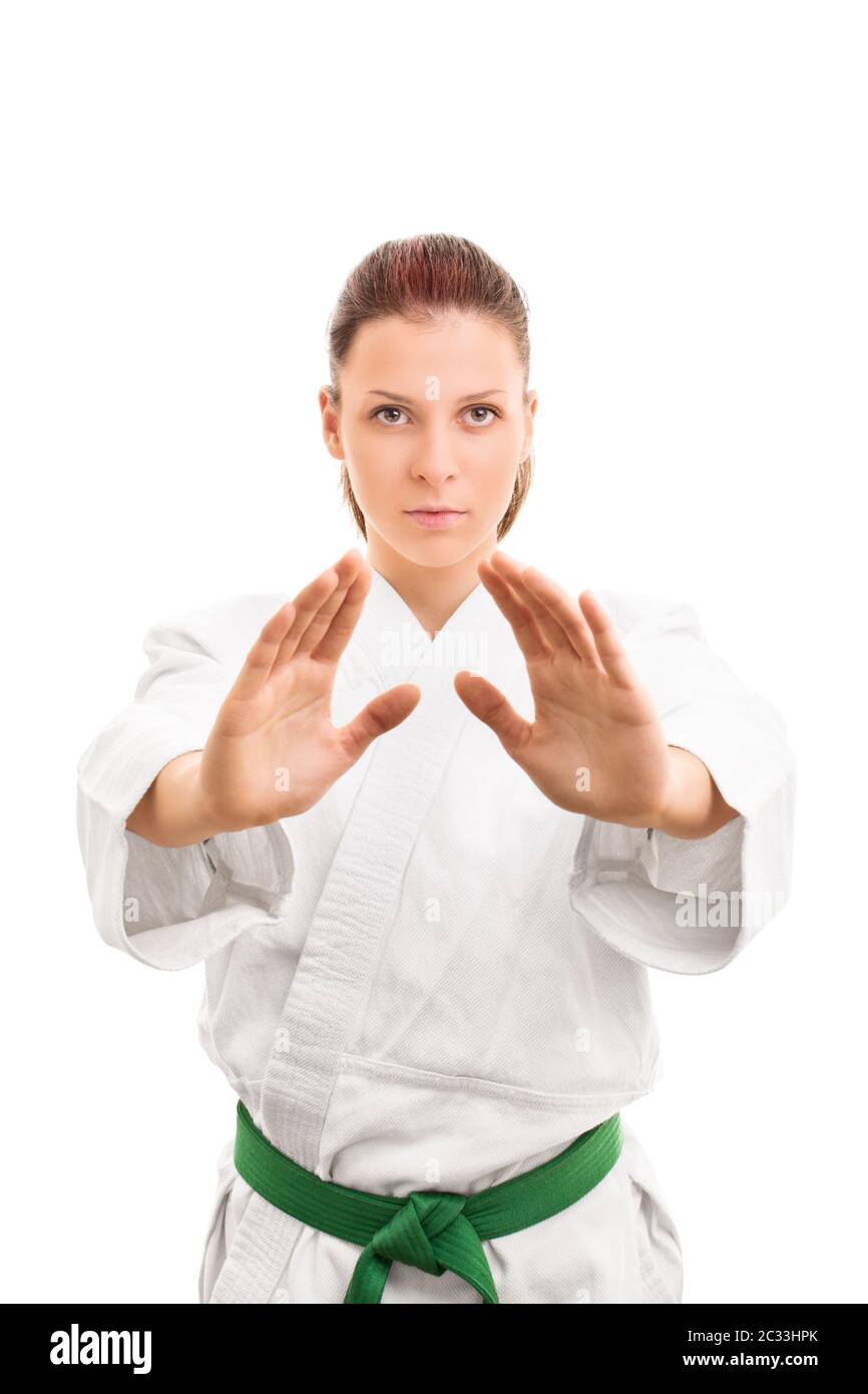 Martial arts concept. Portrait of a beautiful young girl in a kimono