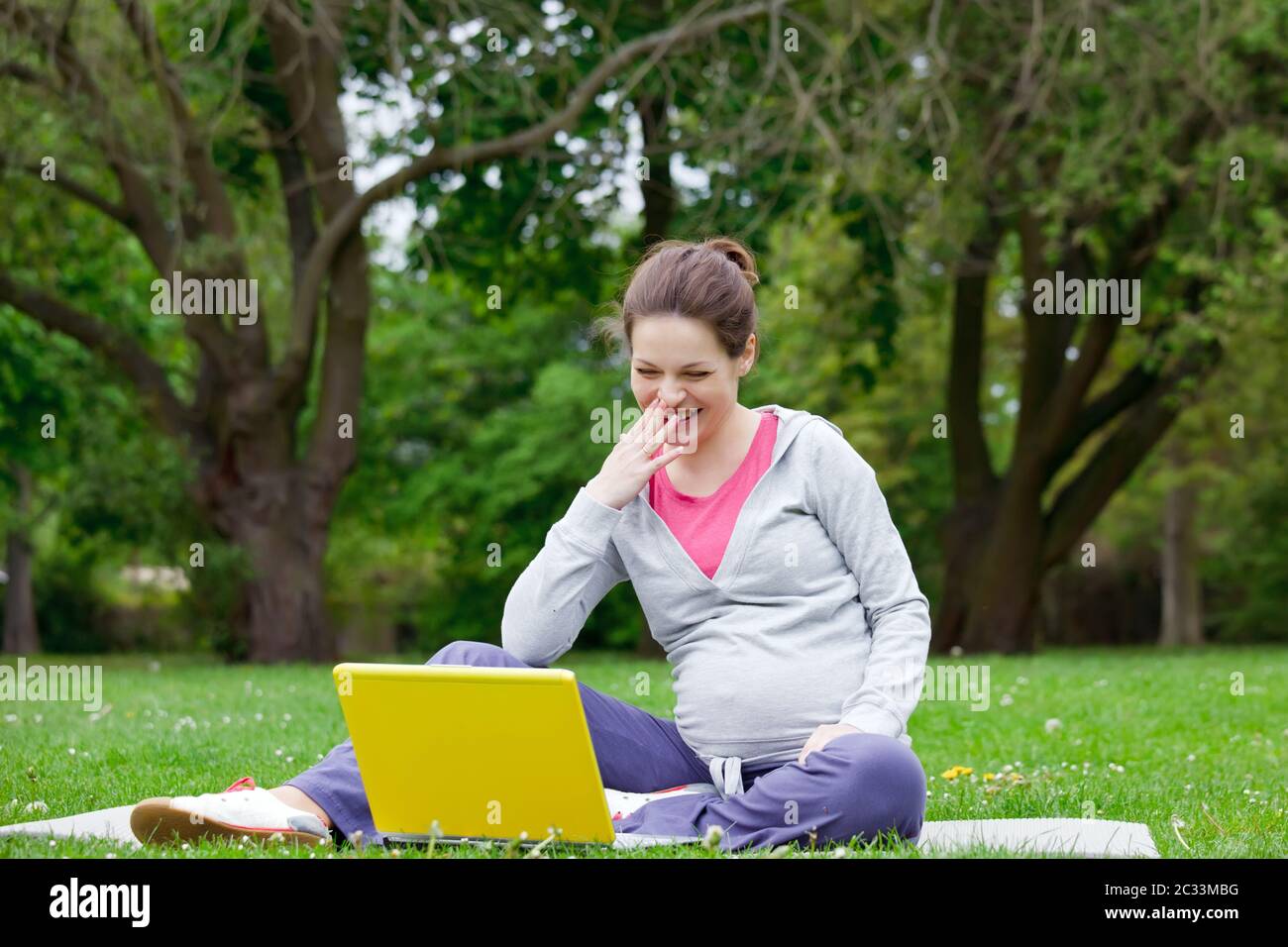 pregnant woman in the park Stock Photo - Alamy