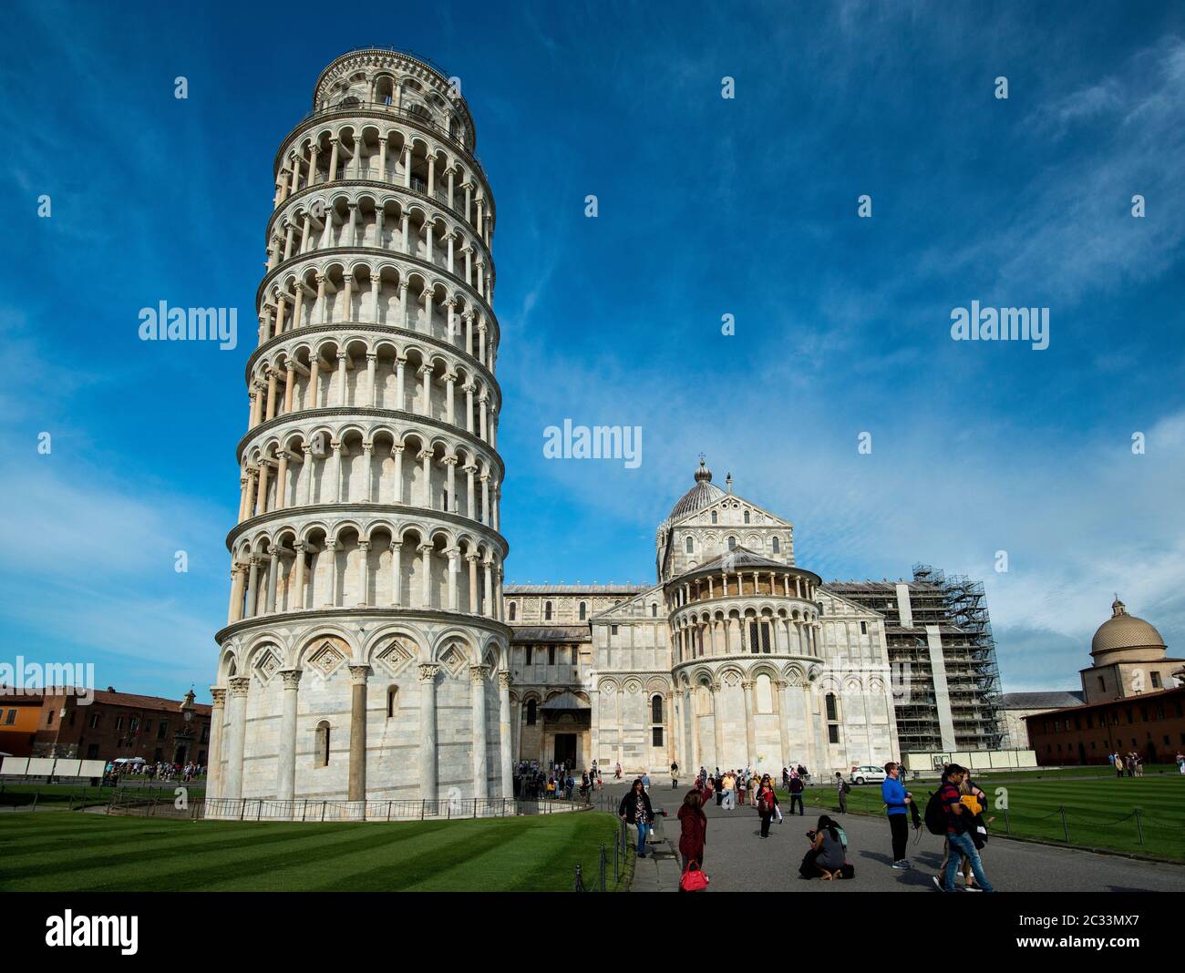 Pisa Cathedral with Leaning Tower of Pisa on Piazza dei Miracoli, Pisa, Tuscany, Italy; dedicated to the Assumption of the Virgin Mary. Stock Photo