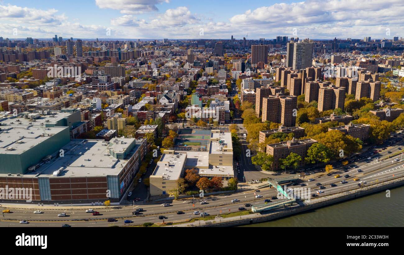 Aerial view over the far north on Manhattan Island in and around Harlem NY Stock Photo