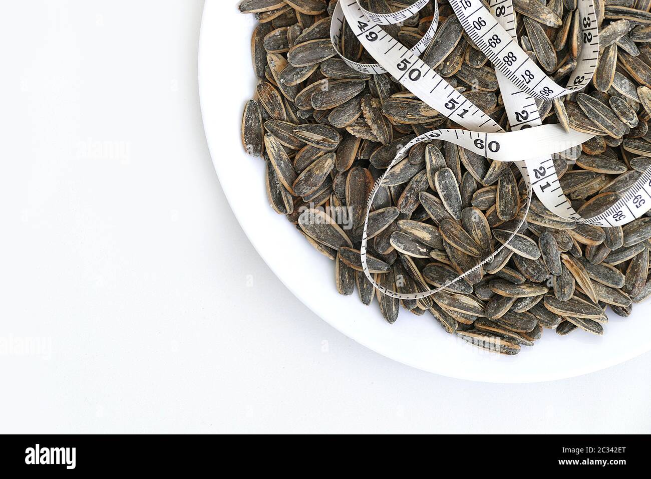 dry roasted and salted sunflower seeds quickly gain unhealthy weight