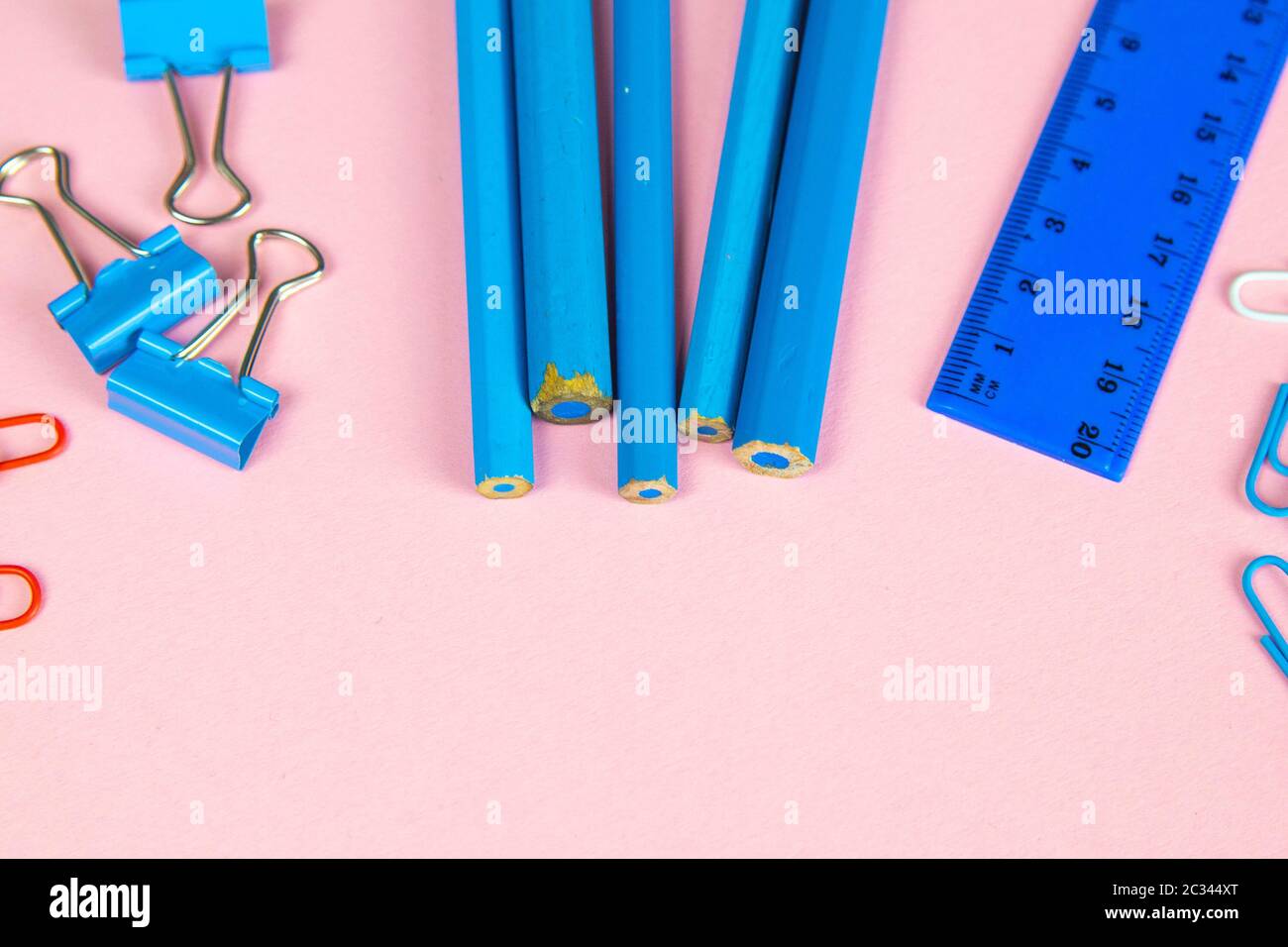 Multicolored blue pencils rulers, pens, pencils and scissors and