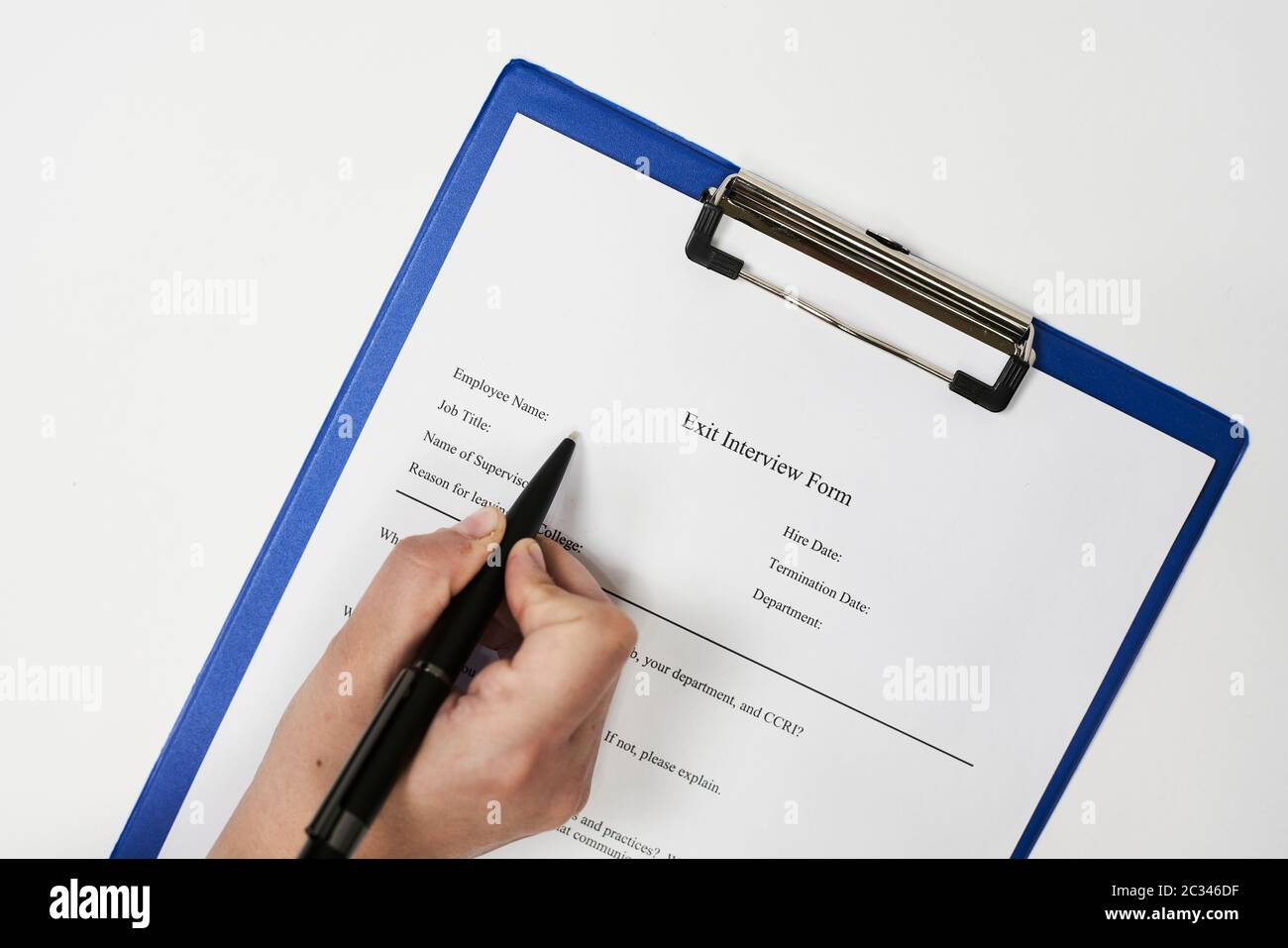 Interview Signature Paper Filling and signing Exit Interview Form document Stock Photo - Alamy
