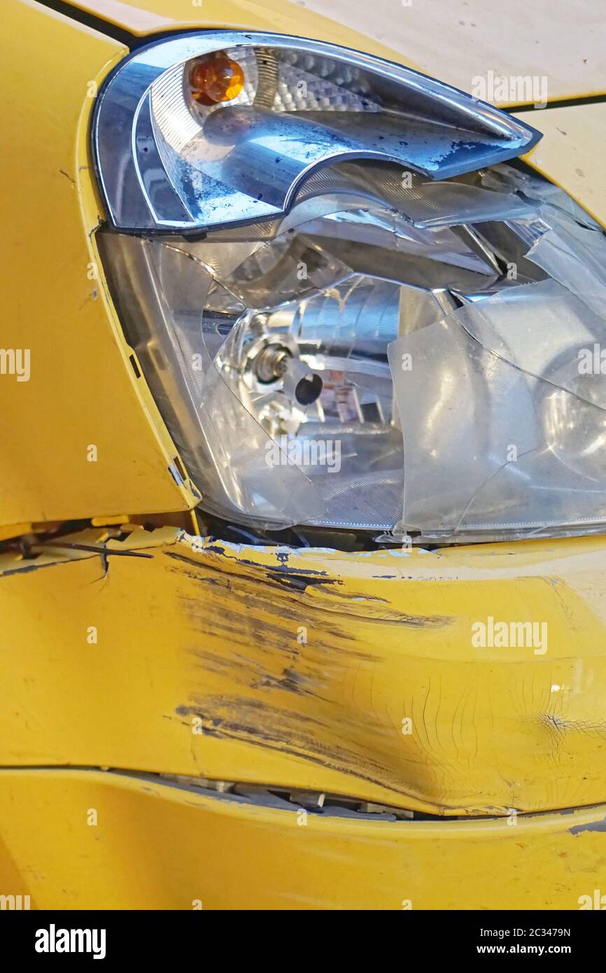 Damaged car front headlight traffic accident problem Stock Photo Alamy