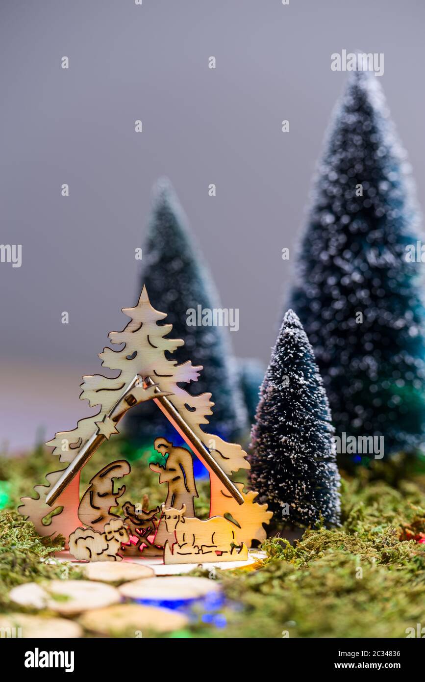 Wooden nativity scene and trees in the presepio Stock Photo - Alamy