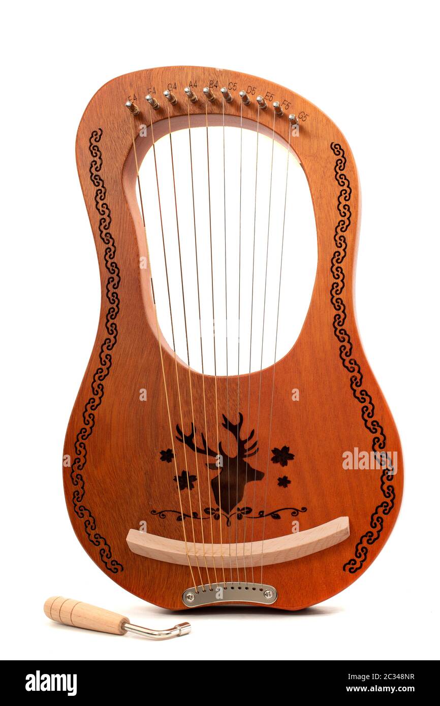 stringed lyre musical instrument isolated on a white background Stock