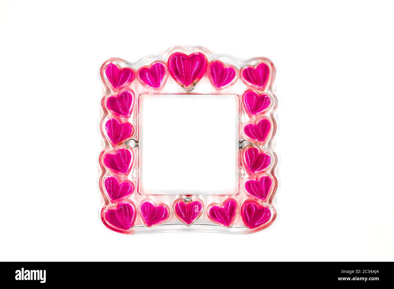Square dish with multiple hearts on a white background Stock Photo